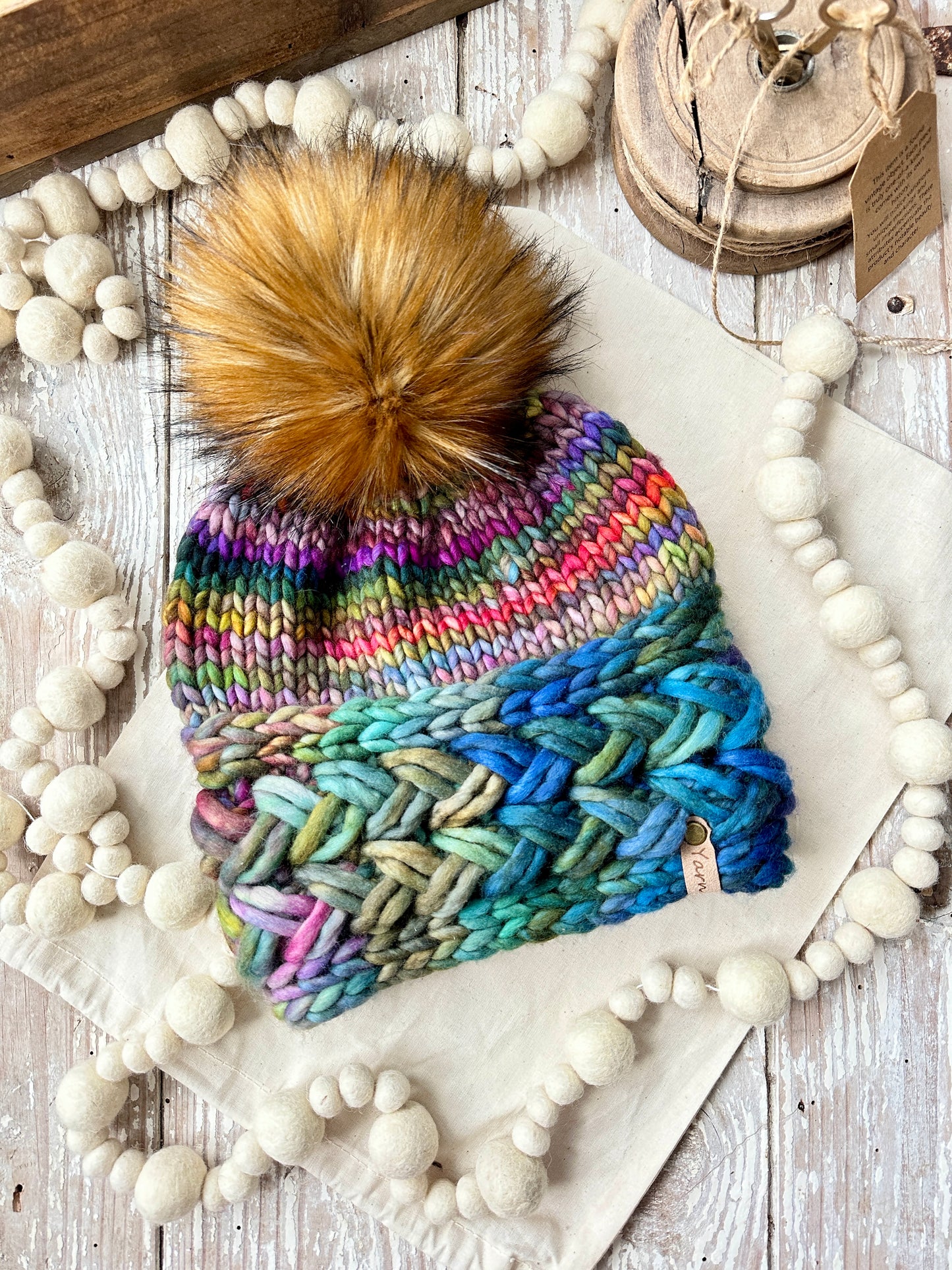 Merino wool knit hat with faux fur Pom