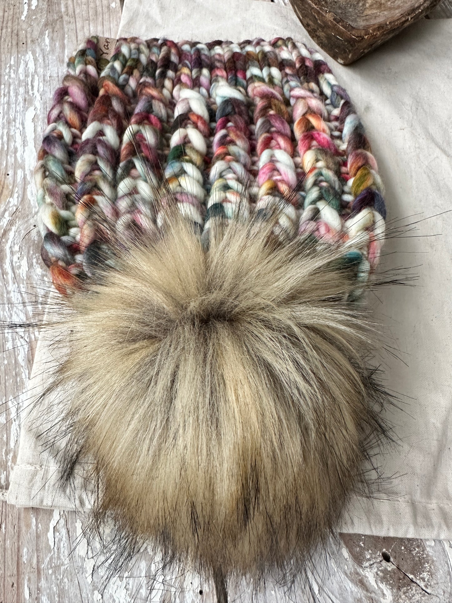 Merino wool knit hat with faux fur Pom