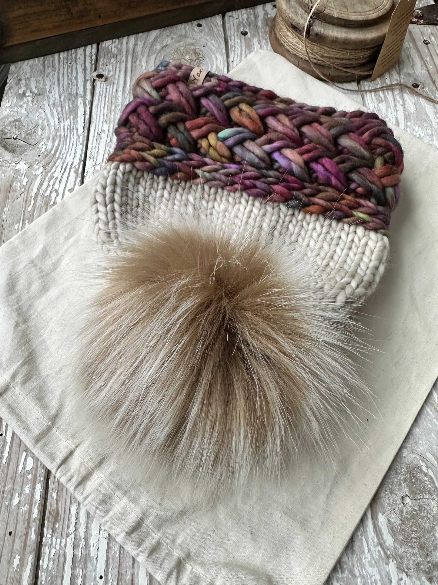 Merino wool knit hat with faux fur Pom