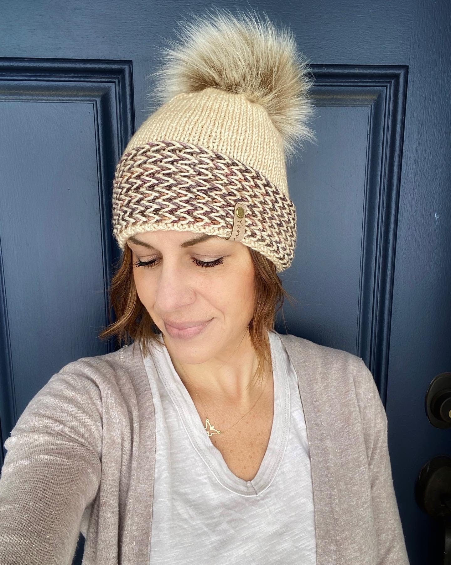 Merino wool knit hat with faux fur Pom