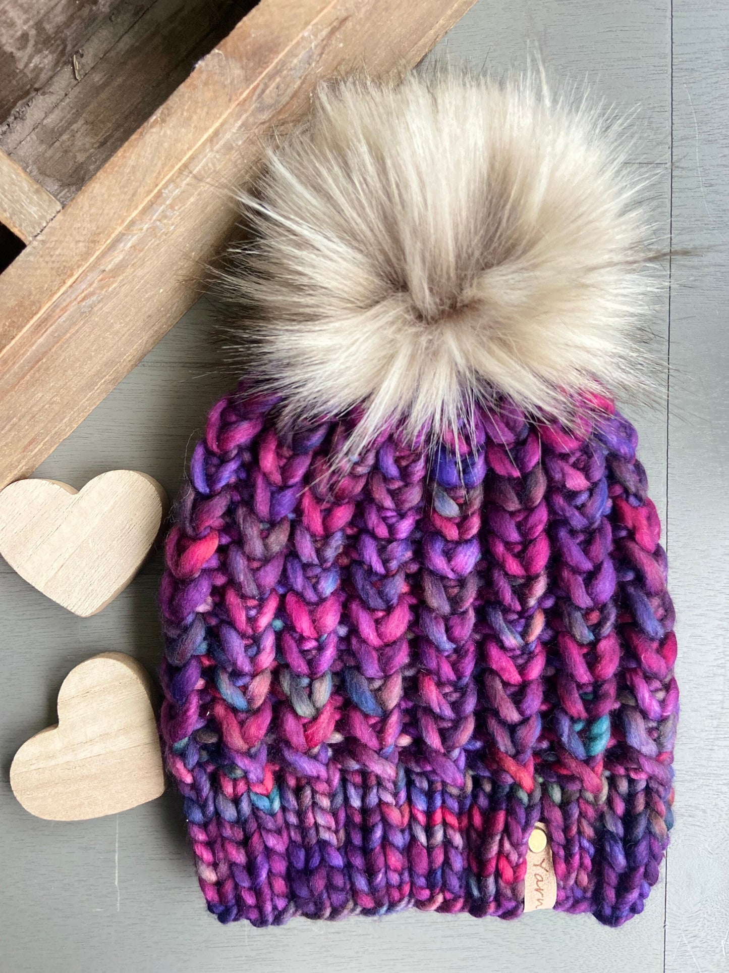 Merino wool knit hat with faux fur Pom