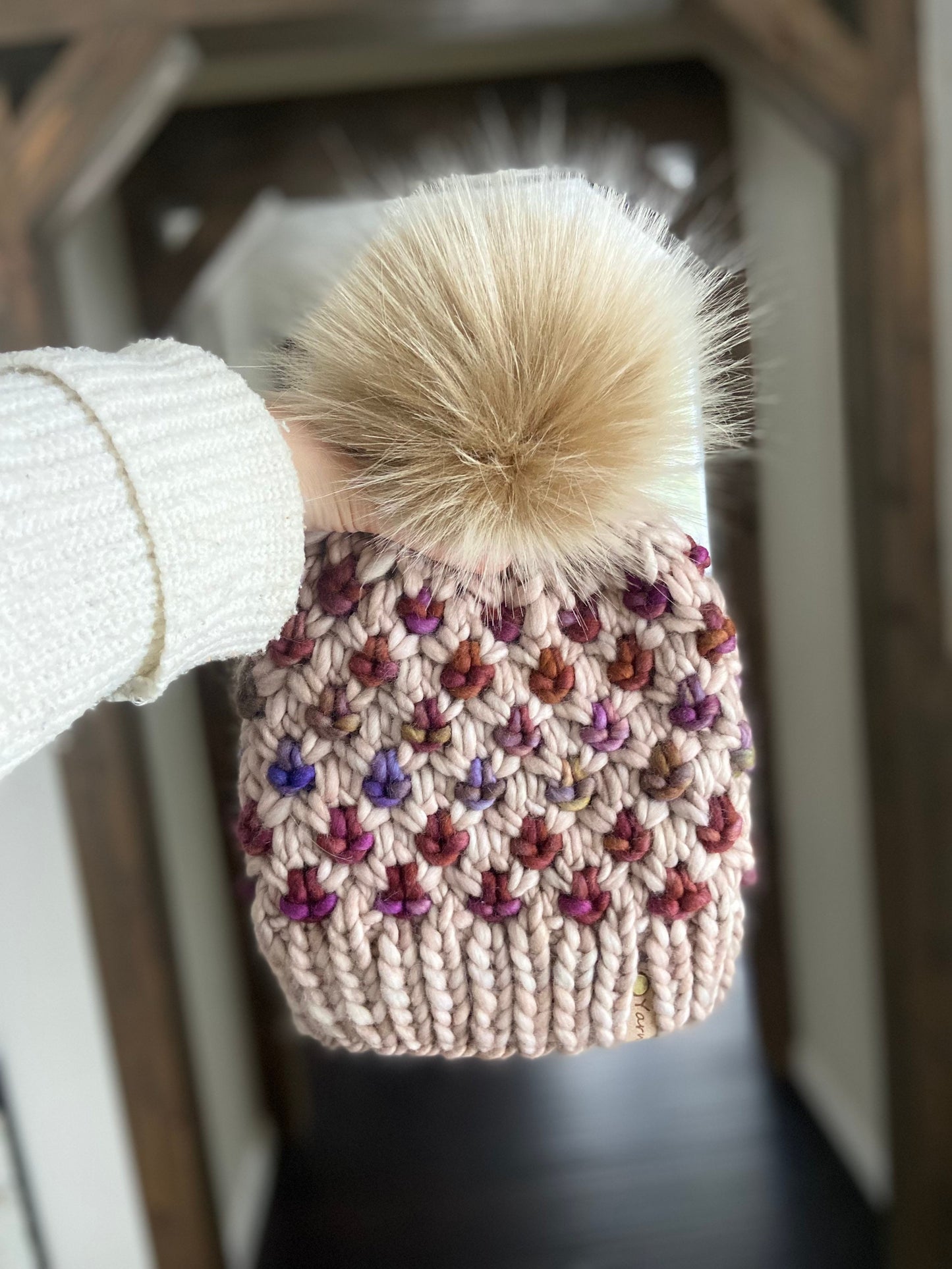 Merino wool knit hat with faux fur Pom