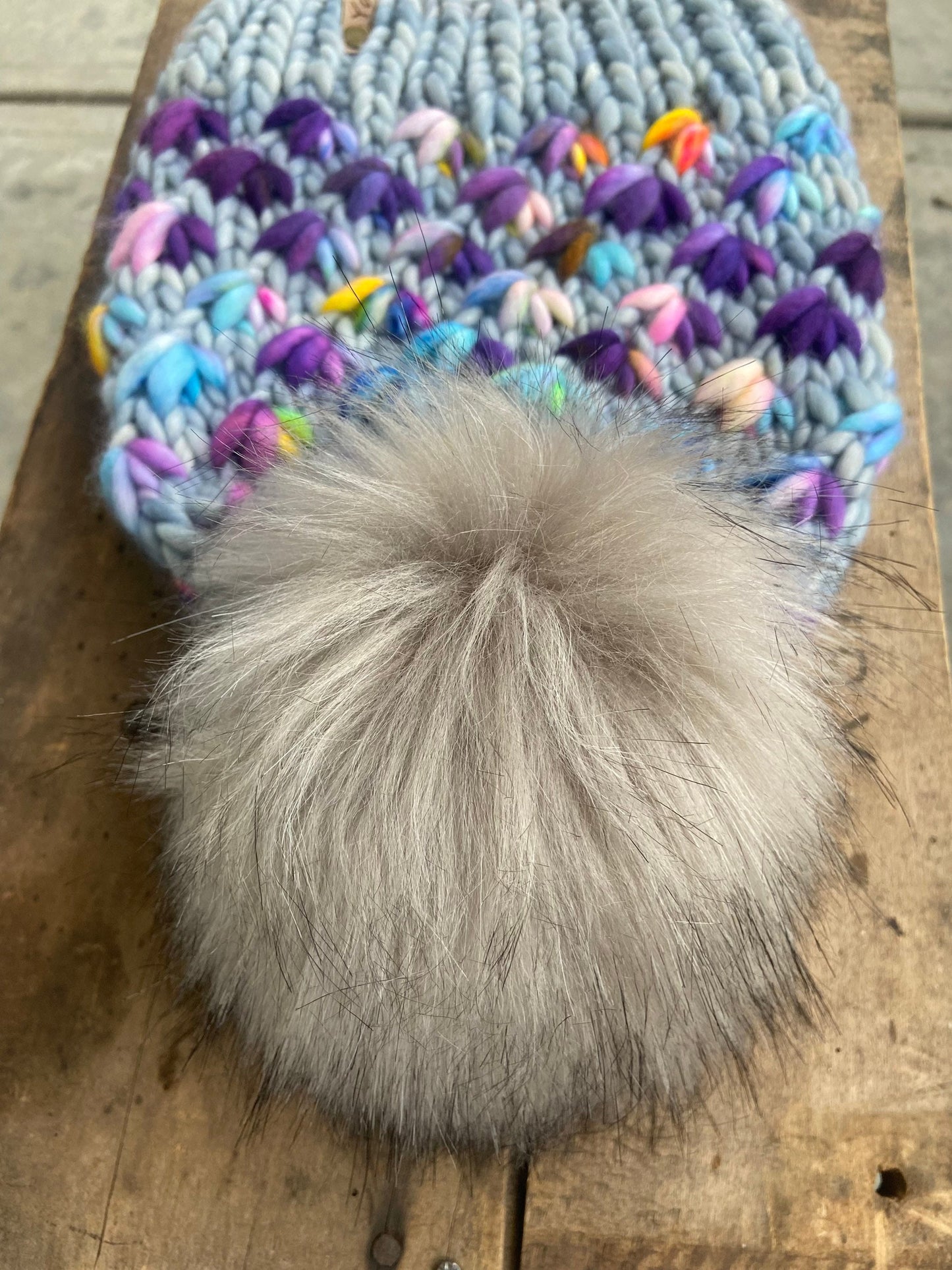 Merino wool knit hat with faux fur Pom