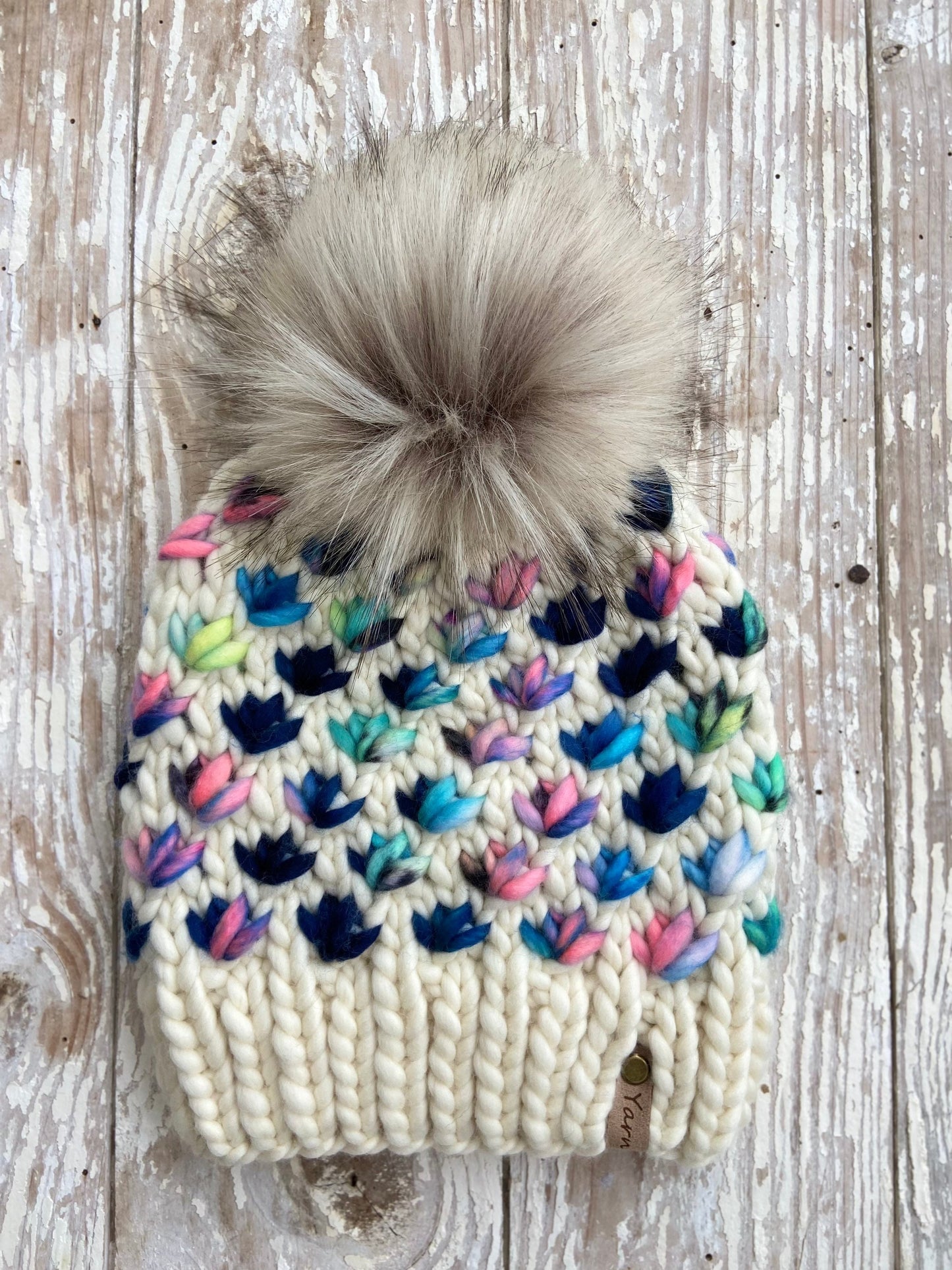 Merino wool knit hat with faux fur Pom