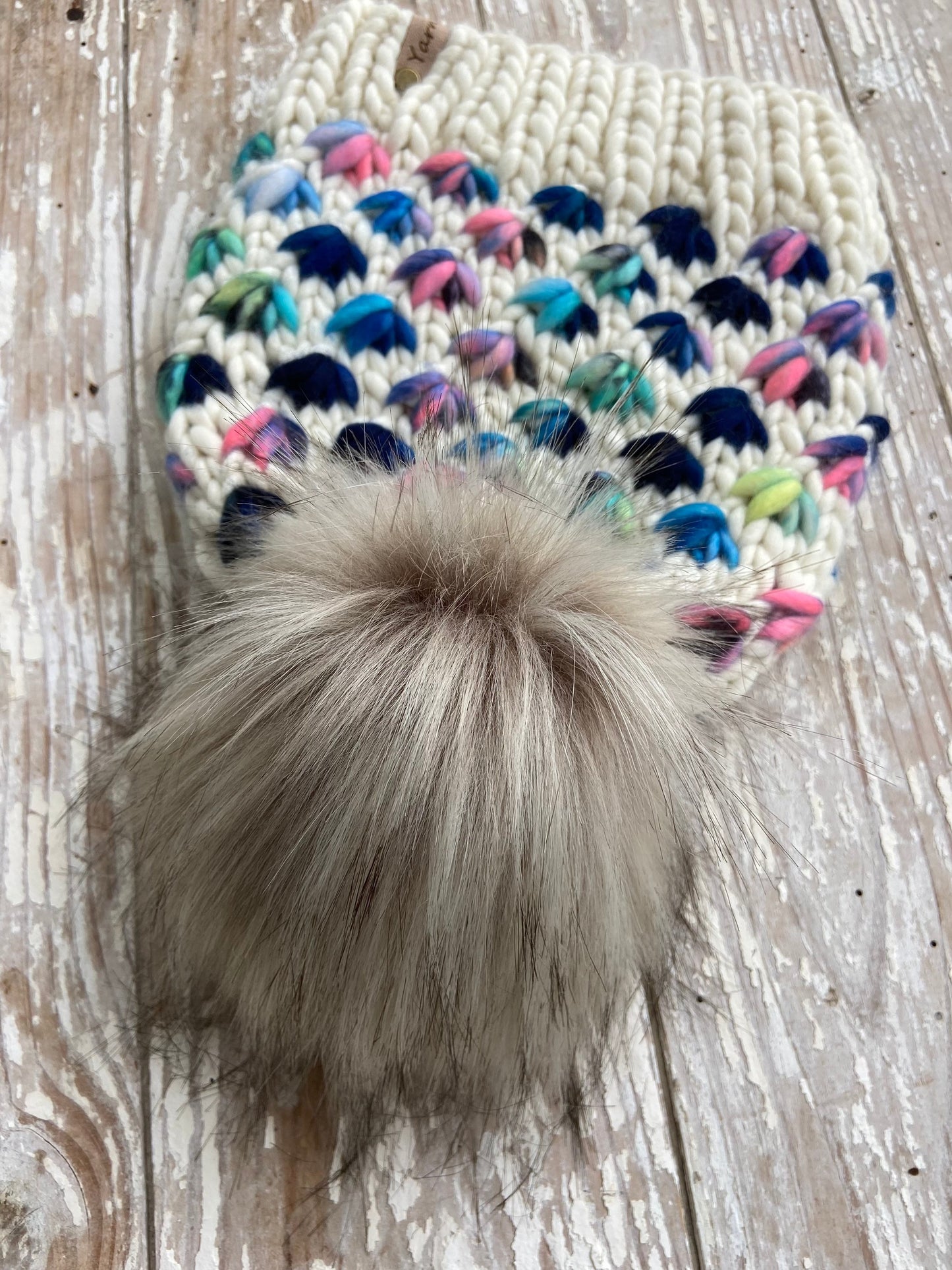 Merino wool knit hat with faux fur Pom