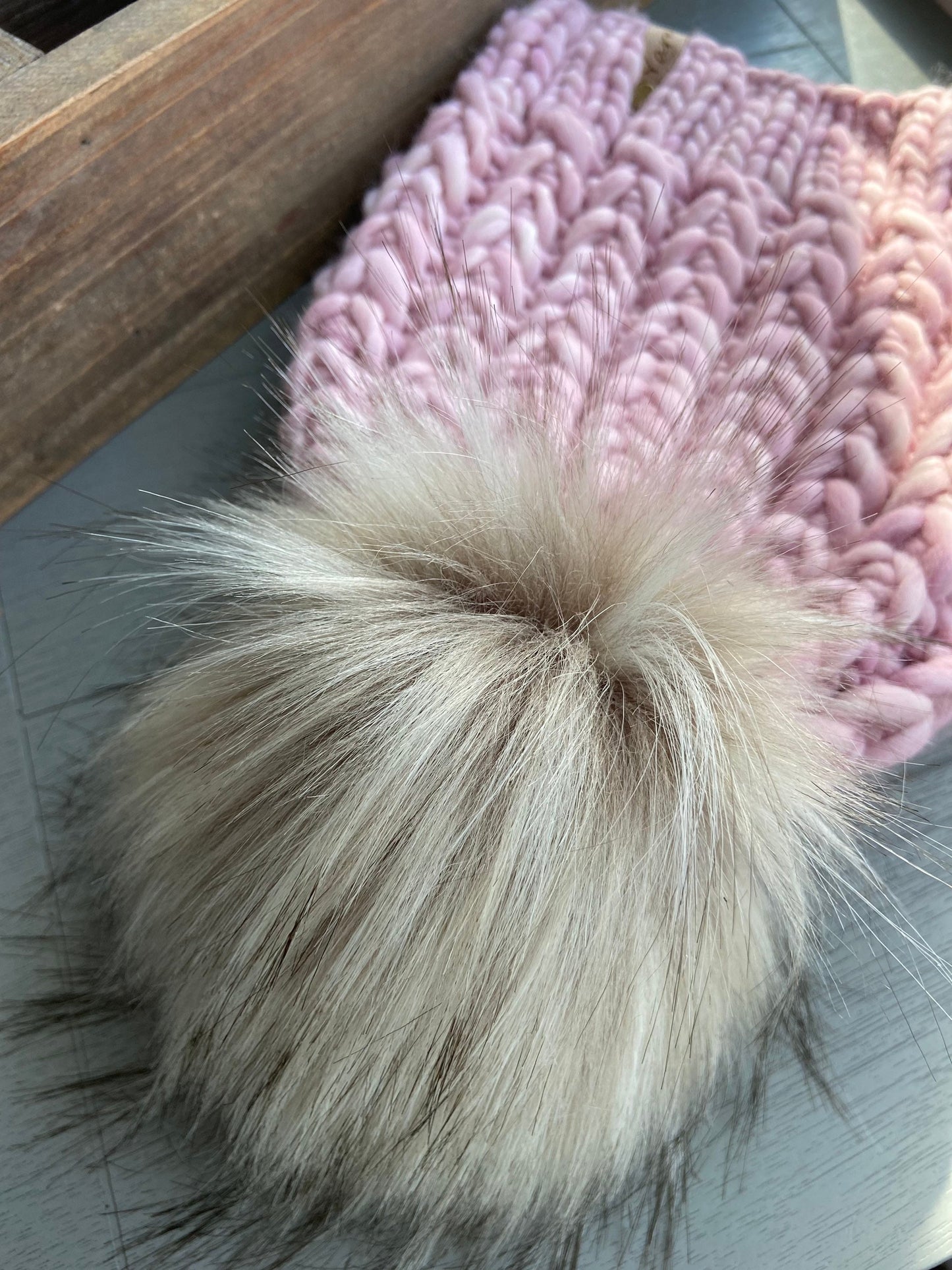 Merino wool knit hat with faux fur Pom