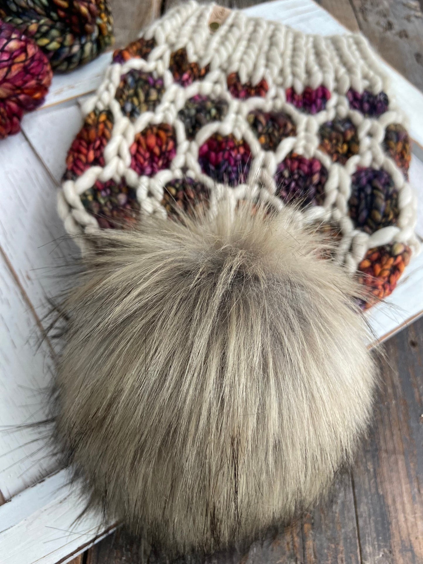 Merino wool knit hat with faux fur Pom