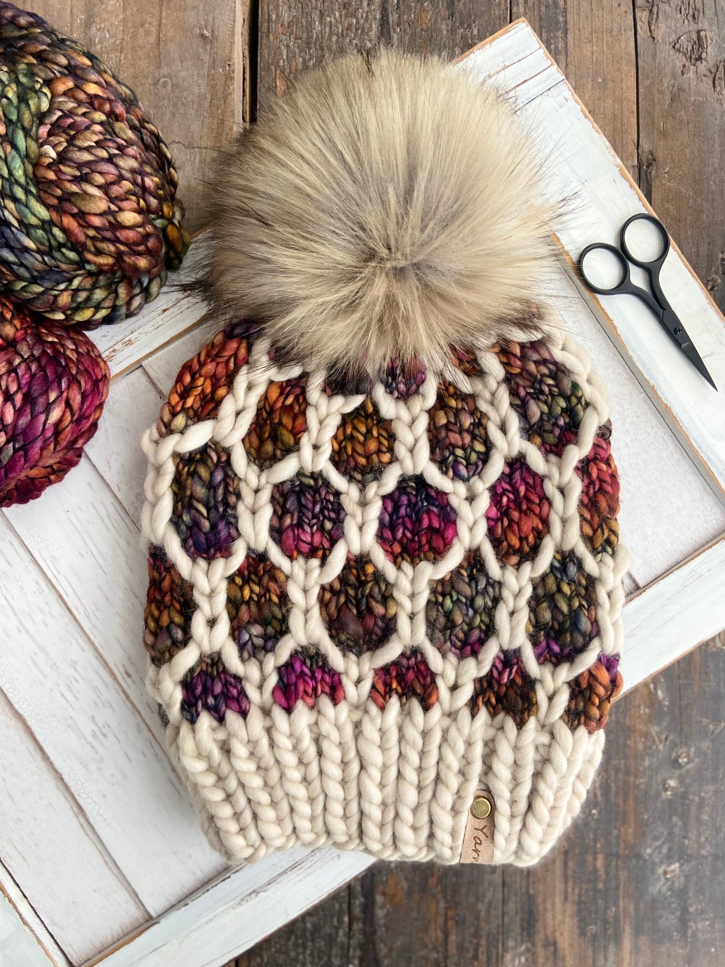 Merino wool knit hat with faux fur Pom