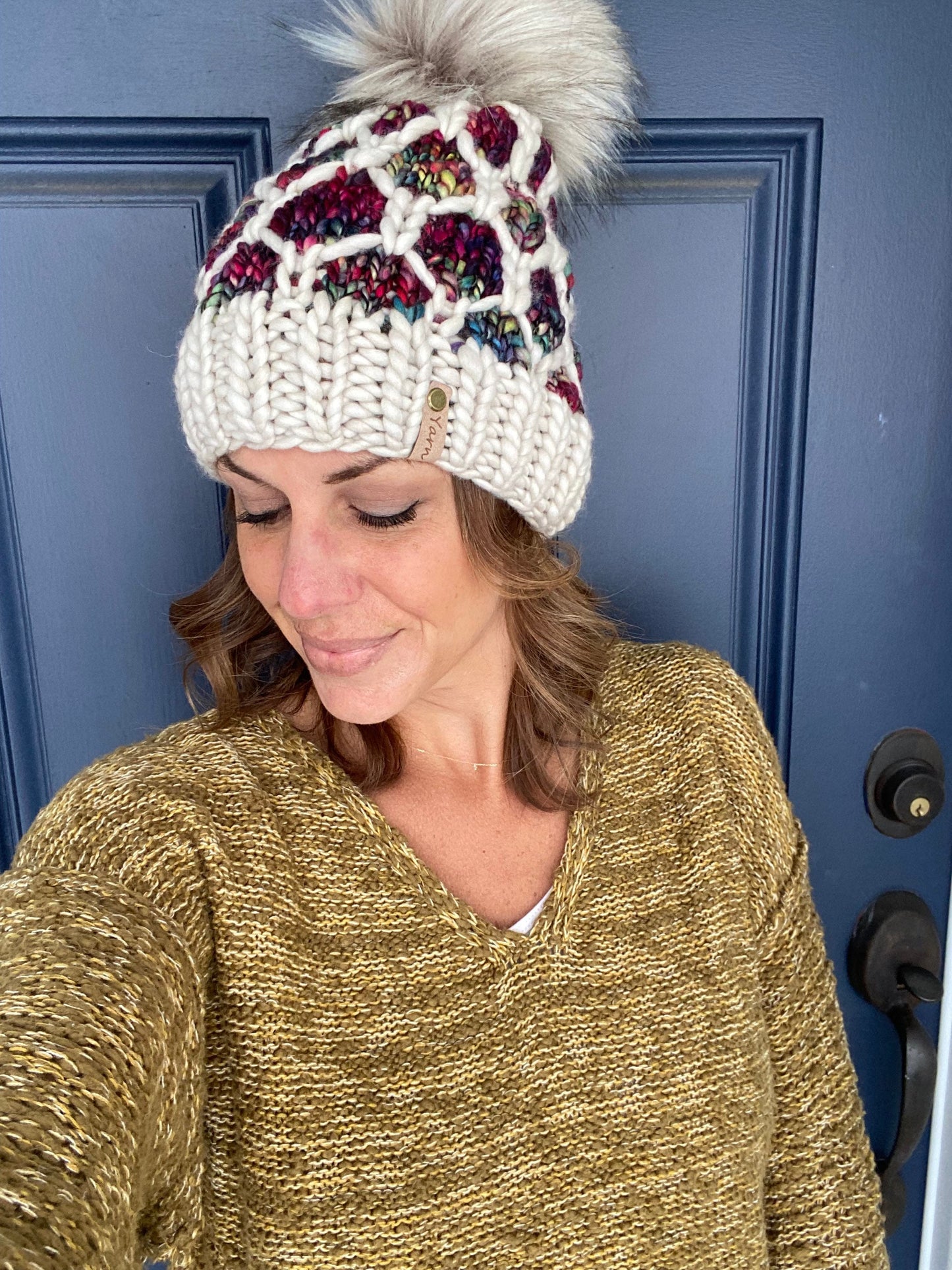 Merino wool knit hat with faux fur Pom