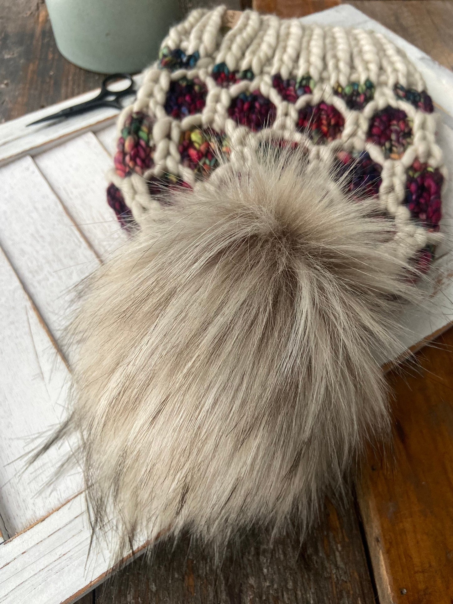 Merino wool knit hat with faux fur Pom