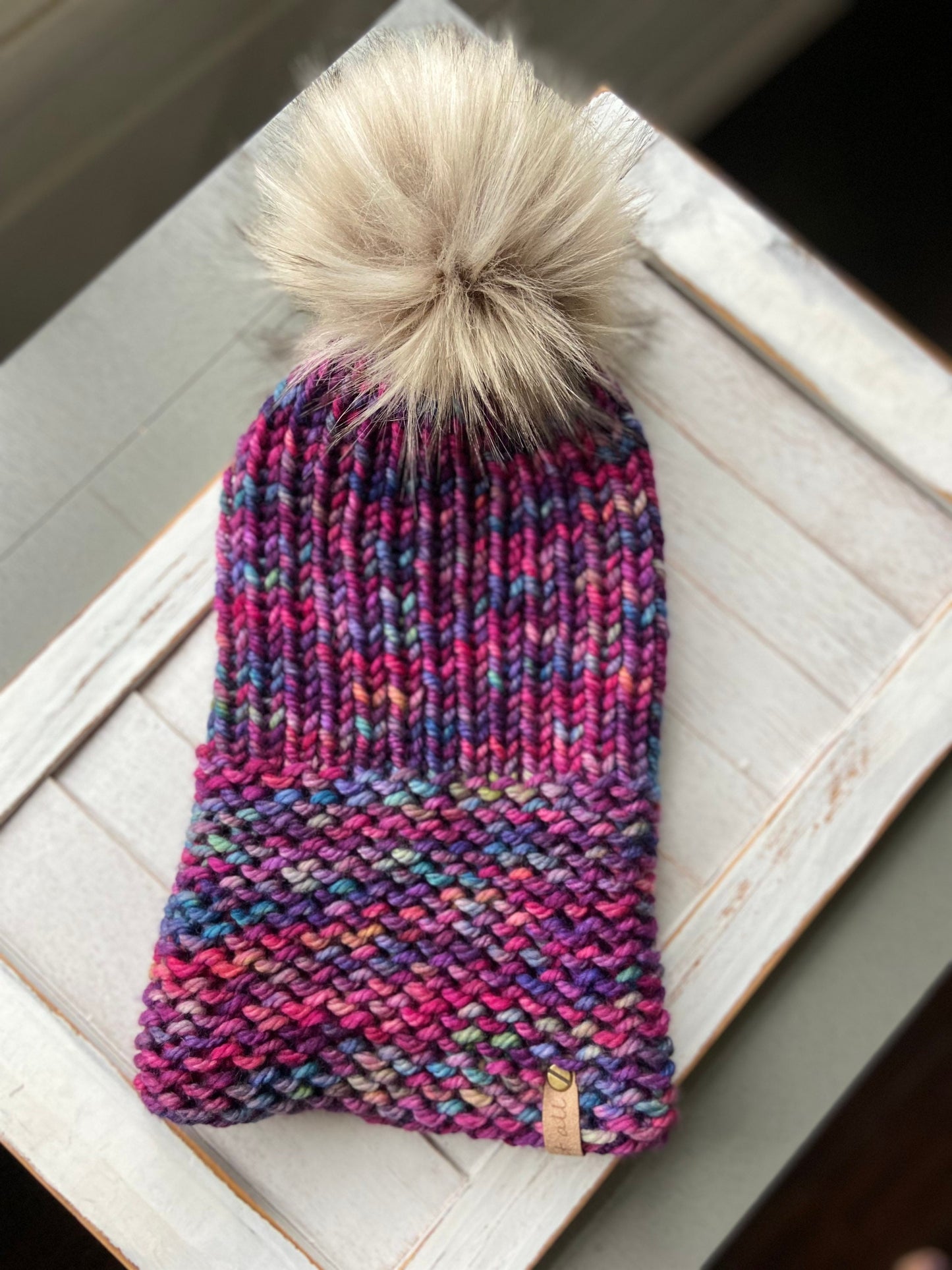 Merino wool folded brim knit hat with faux fur Pom